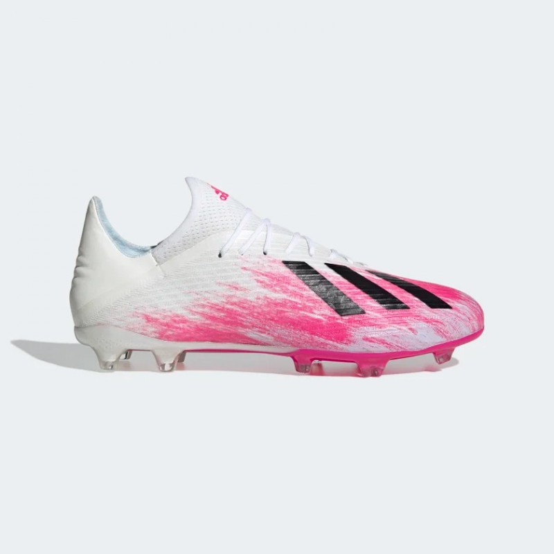 pink and white football shoes